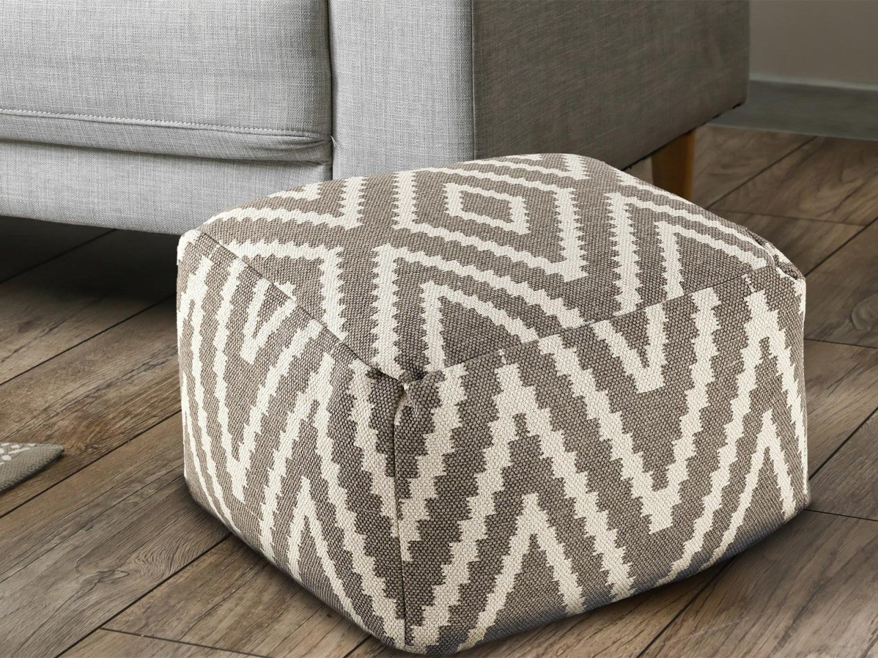 Zitpoef Fira – handgeweven katoen in zwart, taupe, geel en turquoise