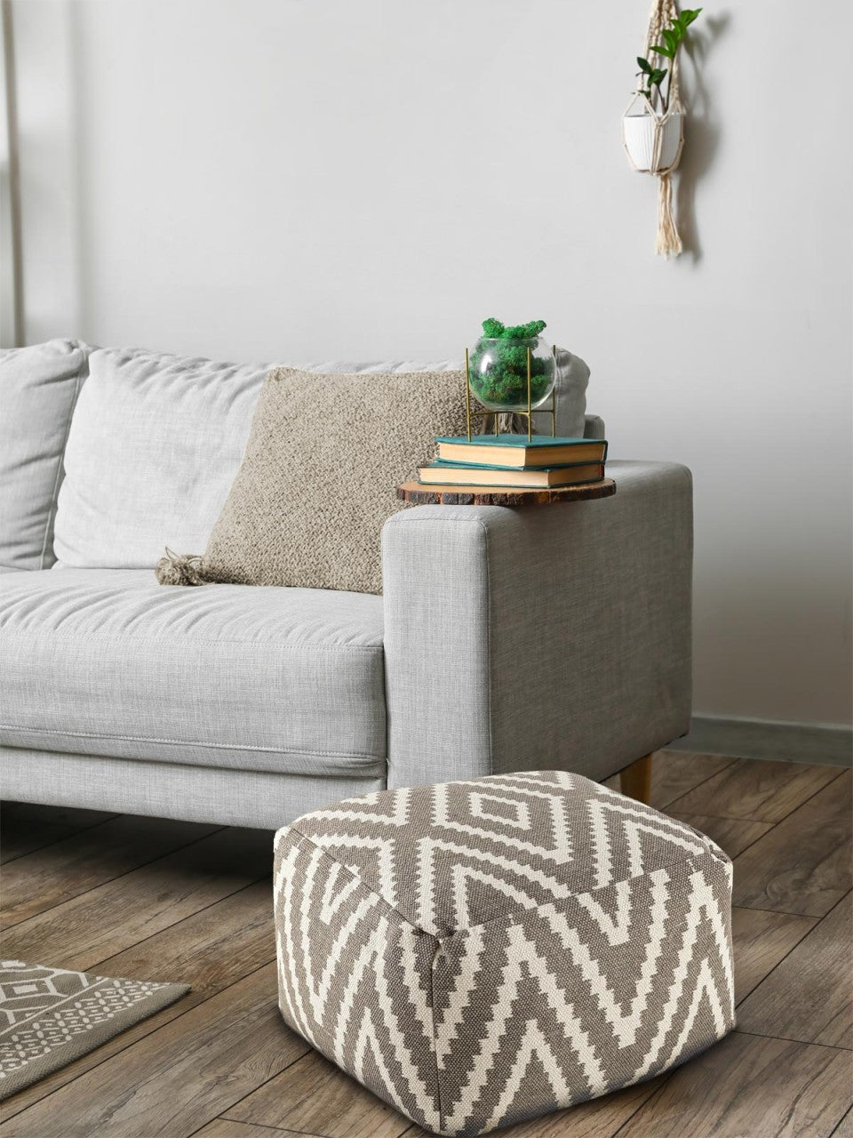 Zitpoef Fira – handgeweven katoen in zwart, taupe, geel en turquoise