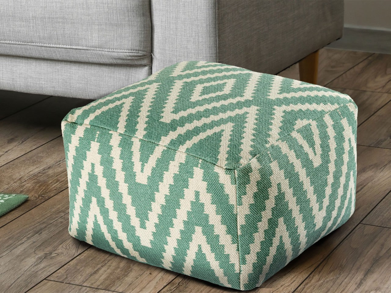 Zitpoef Kelim – handgeweven katoen in zwart, taupe, geel en turquoise