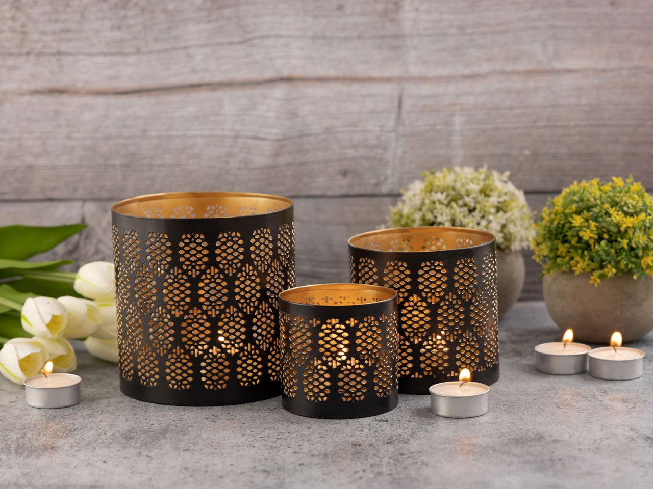 Oriental candle holder set – handmade metal in black and gold