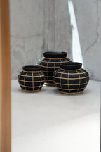 The Belly Vase – terracotta with rattan detail in black