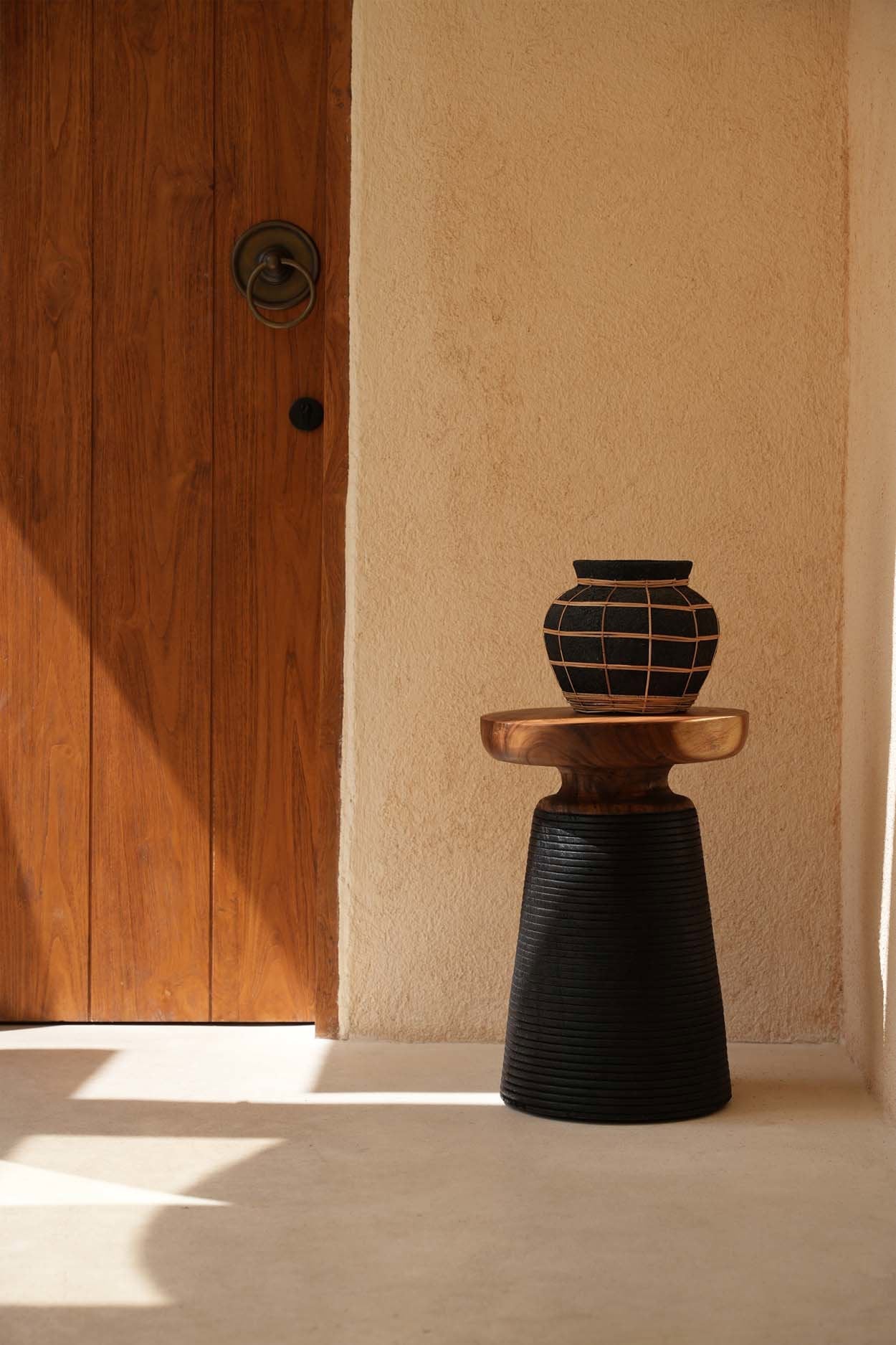 Belly vase M – terracotta with rattan detail in natural black