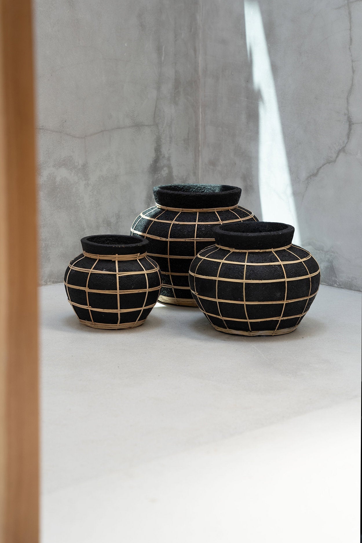 Belly vase M – terracotta with rattan detail in natural black