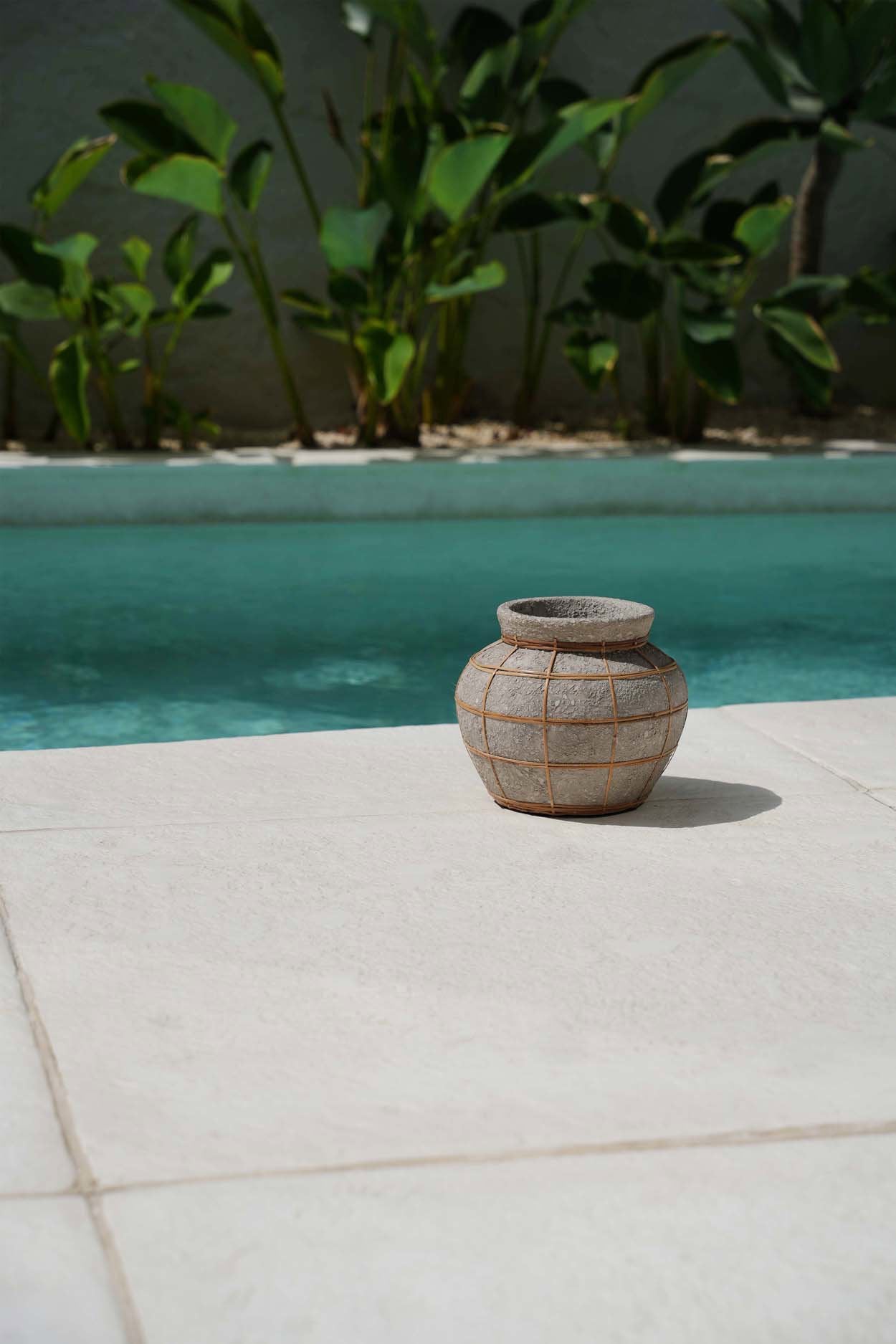 The Belly Vase - terracotta with rattan detail in natural tones