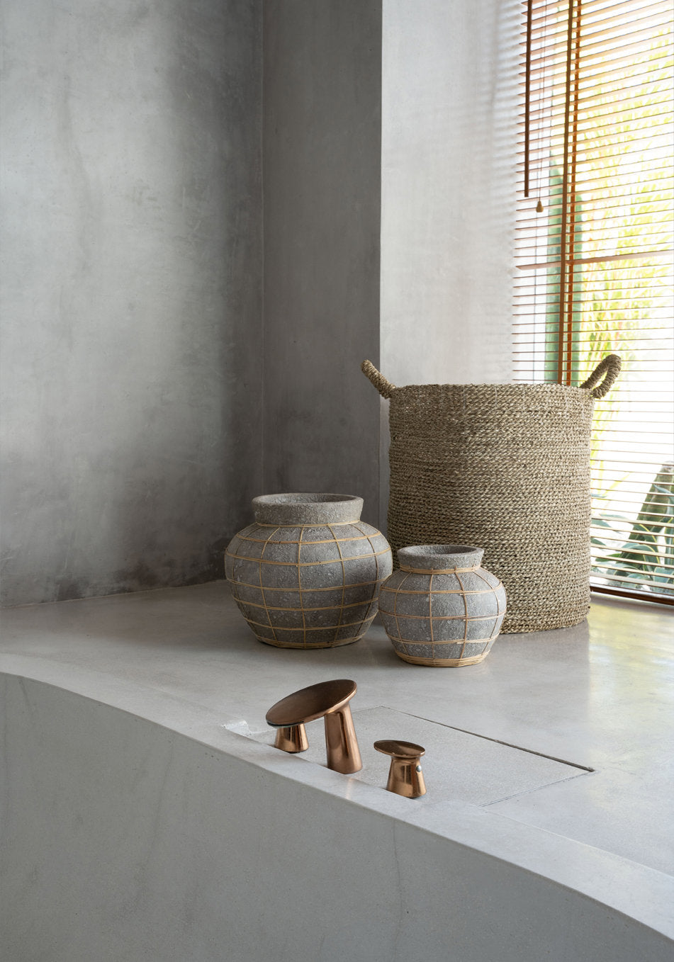 The Belly Vase - terracotta with rattan detail in natural tones