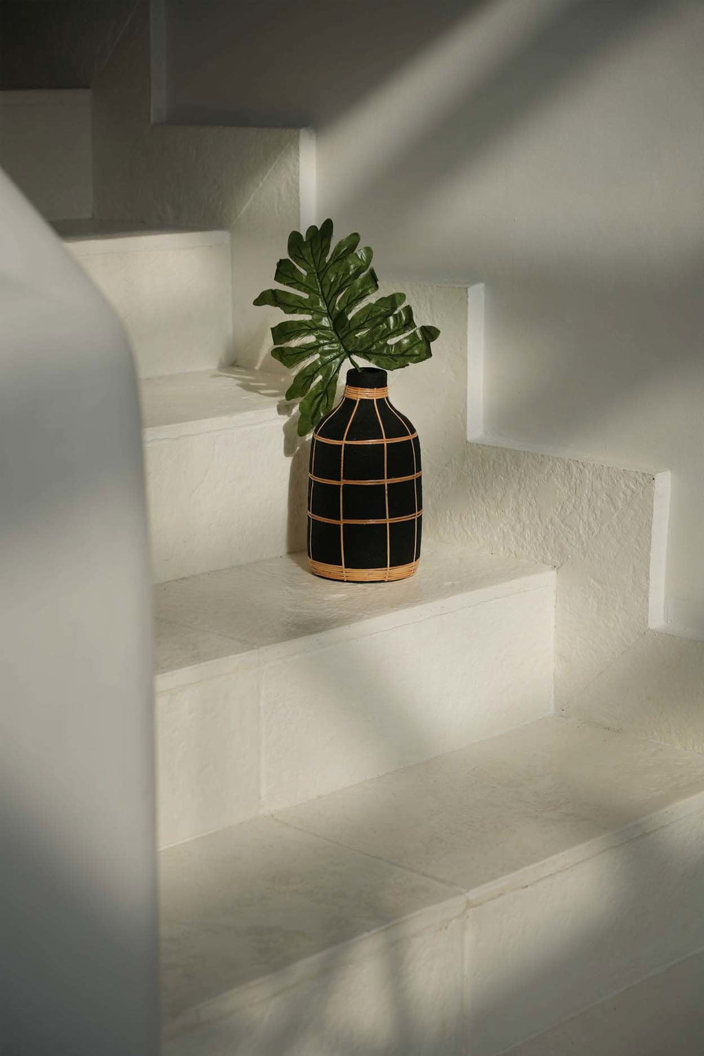 Whoopy Vase – terracotta with rattan details in black and natural